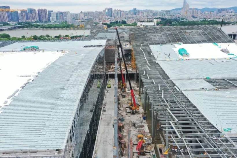 突飞猛进!40余台起重机奋战广交会展馆四期项目